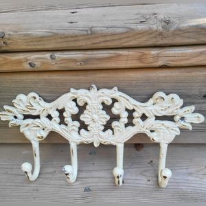 Cream colored cast iron 4 hook wall mount 12"W x 6" H  accent/decor wall hook